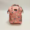 Сумка для мами з термовідділами, сумка-рюкзак на дитячий візок. Рожева з принтом